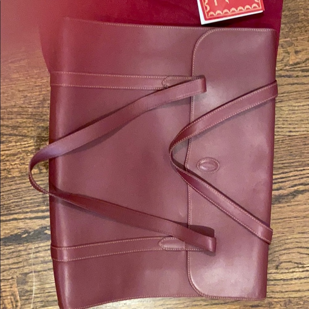 Must de Cartier burgundy leather portfolio bag